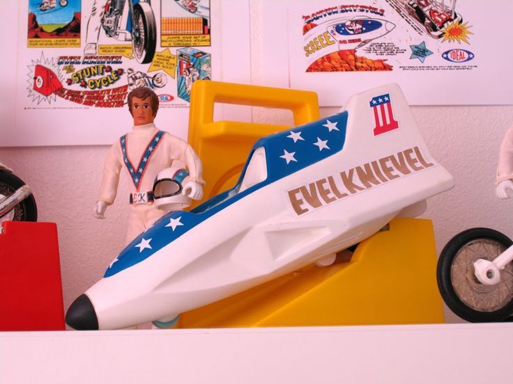 Evel Knievel figure and sky cycle toys. 