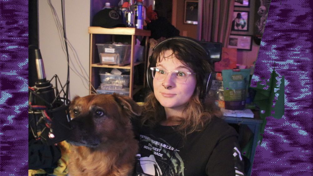 me and my dog sitting side by side in front of a big mic