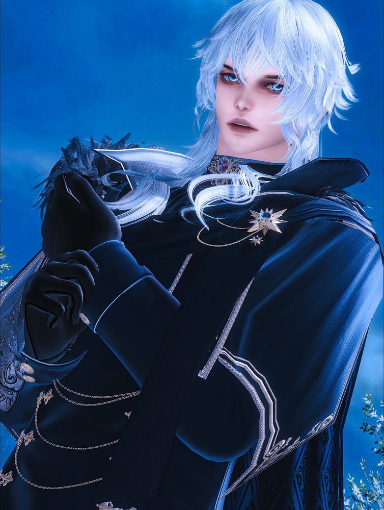 A hyur midlander dressed in a regal blue and gold outfit stands under a cold blue sky. He has long, wavy white hair and bright silver eyes.