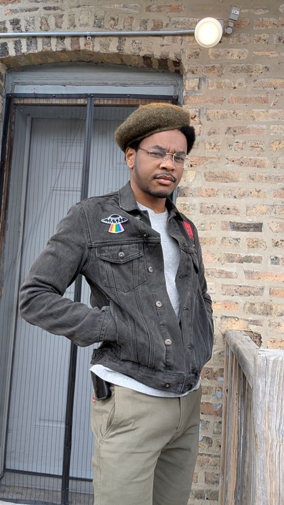 Me in a denim jacket with a fun hat! The hat is a green beret