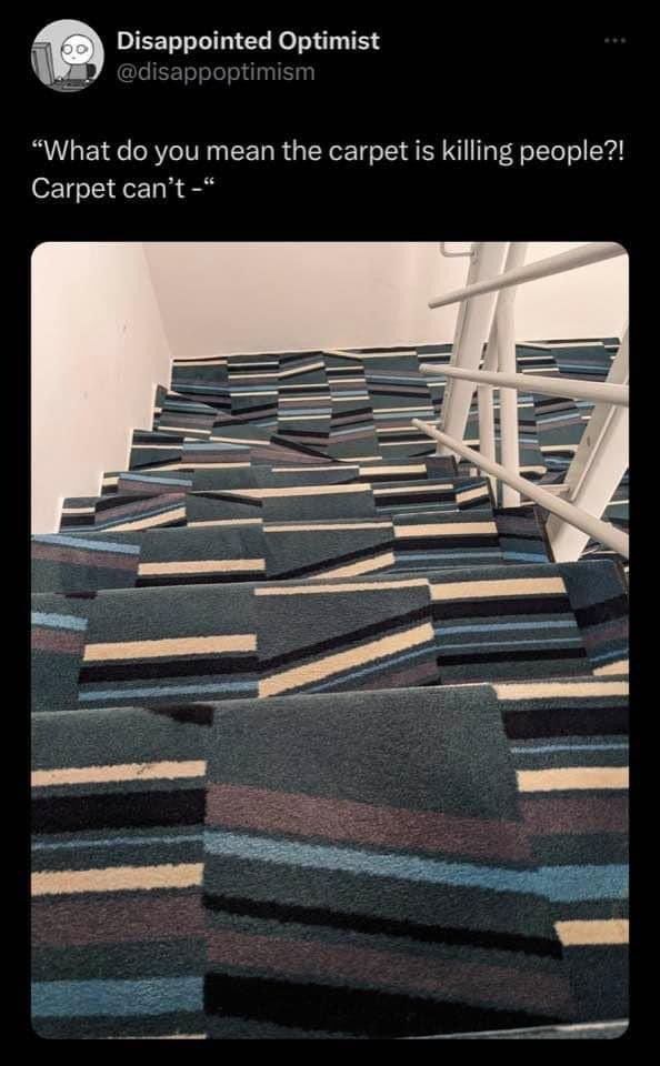 Stairs carpeted with a pattern that makes the stairs almost completely impossible to identify