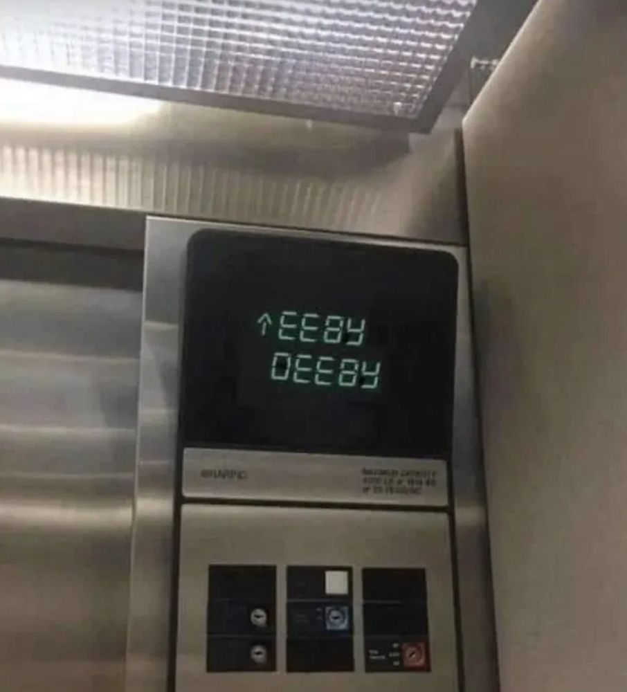 An elevator headed up, apparently, to "Eeby Deeby".