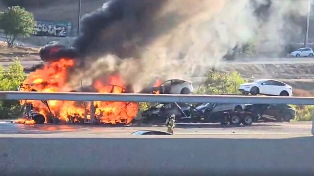 Roads along the 5 Freeway in Sylmar were shut down after a semi-truck carrying Tesla vehicles was engulfed in flames Saturday. Los Angeles Fire Department crews responded to the southbound lanes, j…
