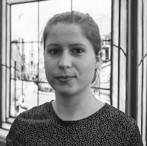 A black and white photo of Alana