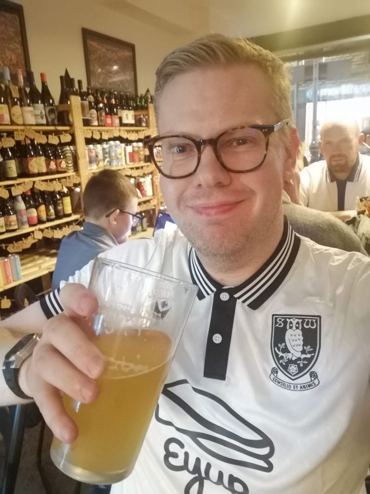 Me drinking a pint at The Pangolin.