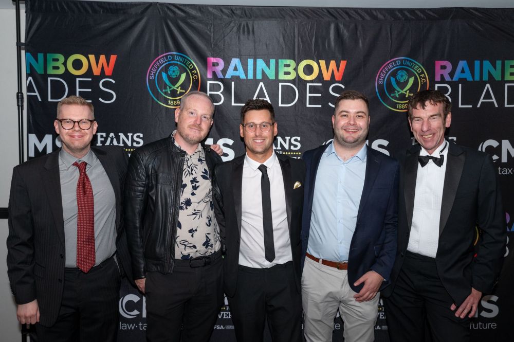 A photo of myself with representatives from Proud Forest, Rainbow Blades, Proud Forest and RainbOs at Rainbow Blades' fifth anniversary gala.