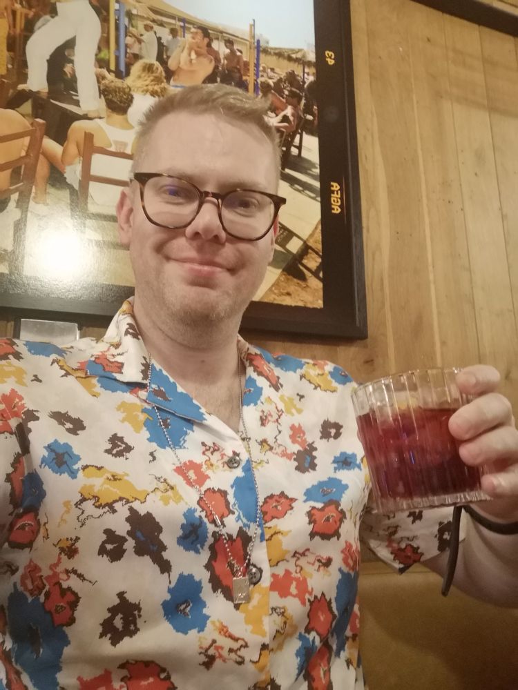 A selfie of me drinking a negroni from The Social.