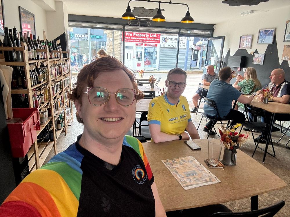 A photo of me with Three Lions Pride co-founder Joe White enjoying drinks together at The Pangolin.