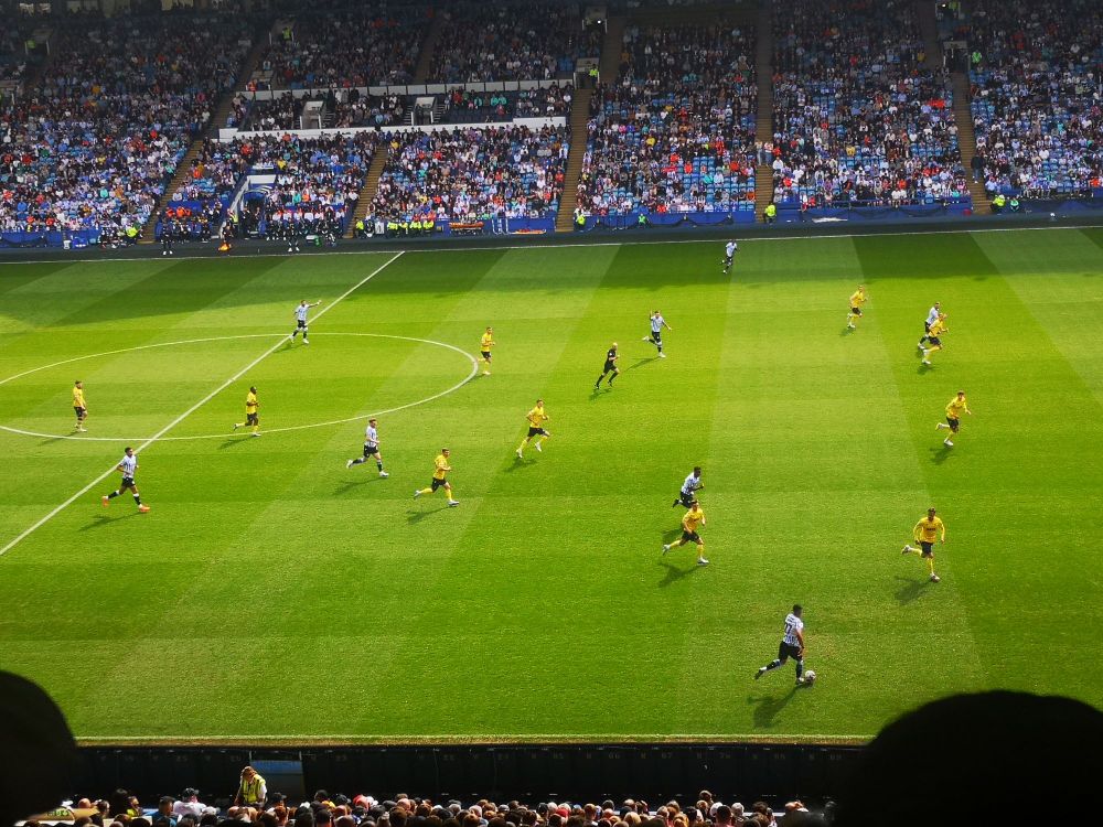A snapshot of Yan Valery attacking on the right wing for Sheffield Wednesday against Oxford United.