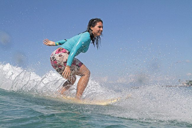 Tulsi Gabbard surfing and looking fine
