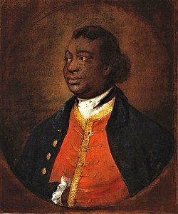Portrait of Ignatius Sancho painted by Thomas Gainsborough. Sancho look to the left. He is wearing a red waistcoat with gold trimming and a dark jacket. 