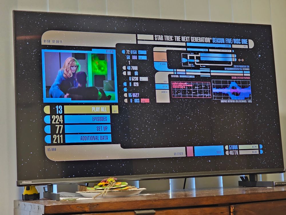 Shows tv displaying bluray menu for disc one of season 5 of Star Trek The Next Generation 
