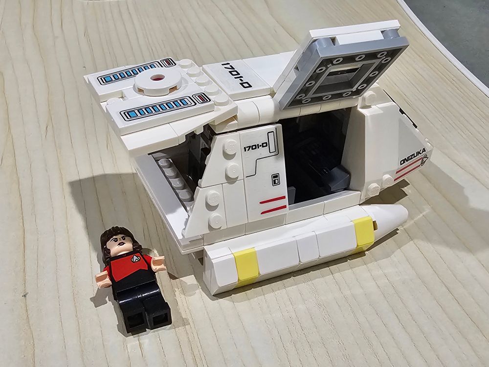 Lego shuttle from Star Trek The Next Generation and minifig of Ro Laren.