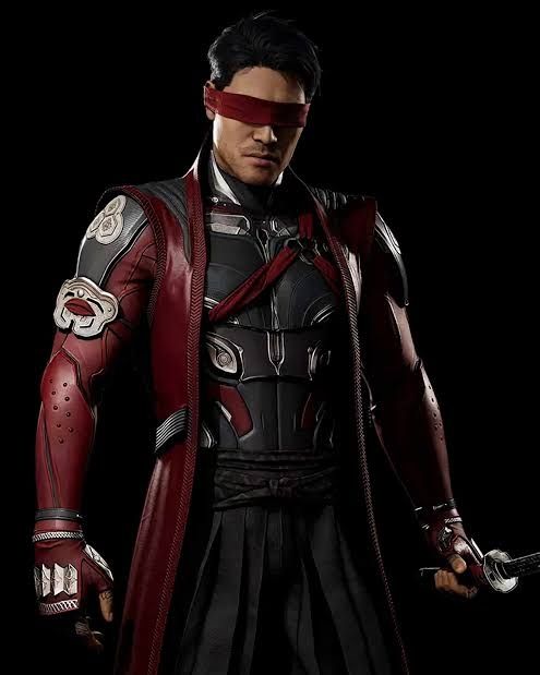 Image shows Kenshi from Mortal Kombat 1 from the thigh upwards. He wears a red and black outfit with a red eyeband.