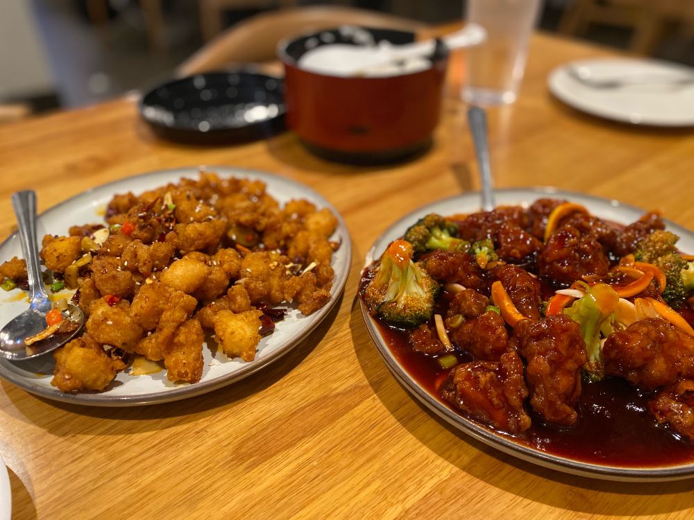 Two plates of authentic Szechuan food
