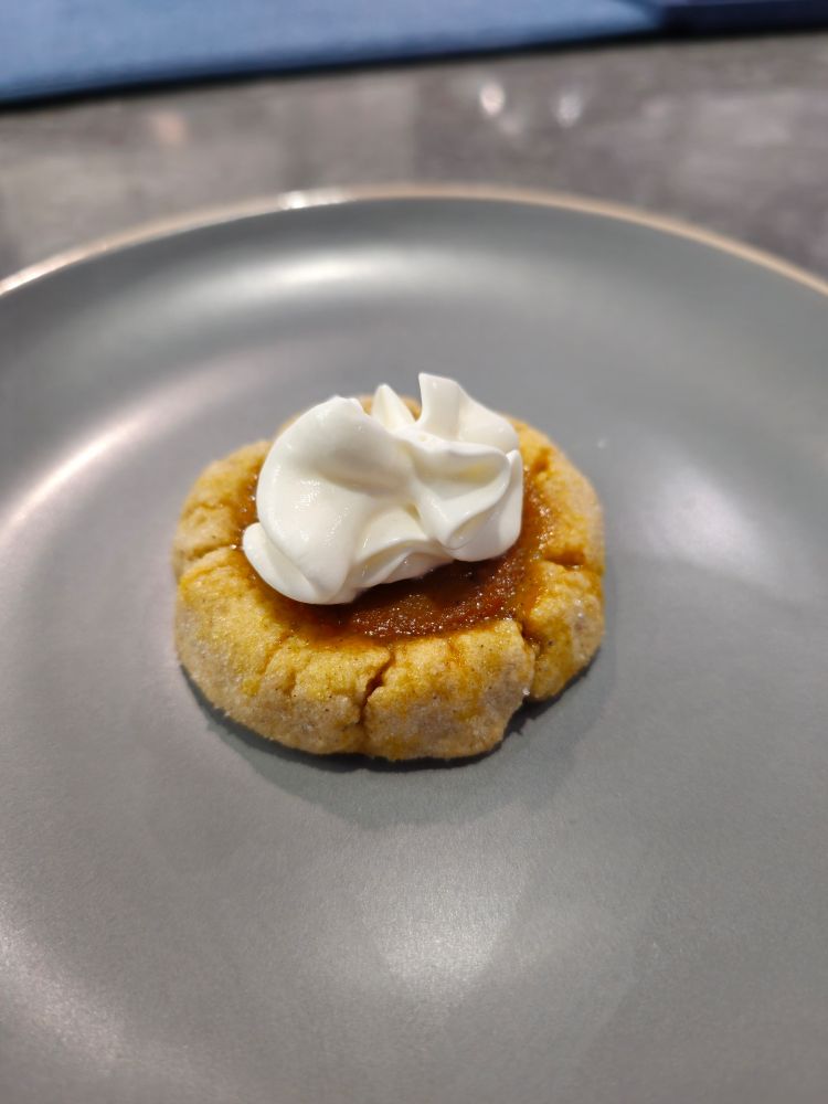 Pumpkin pie cookie with whipped cream on top