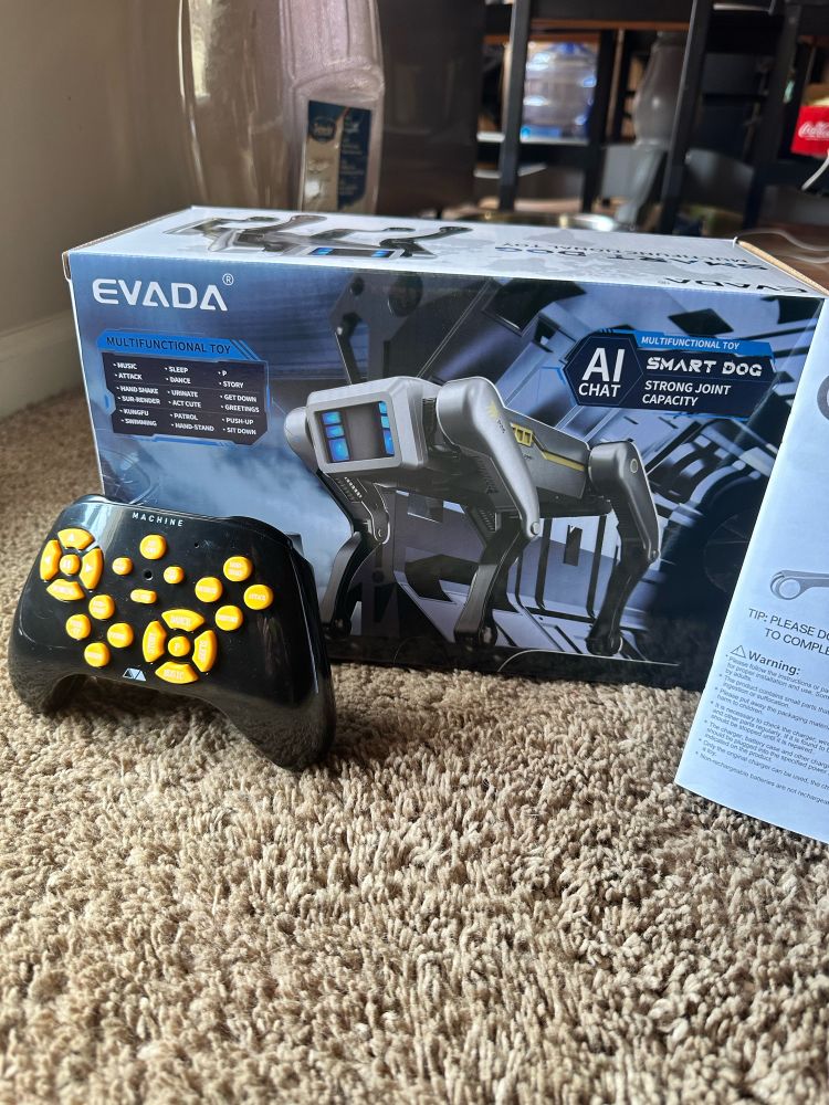 A box with a creepy robot dog on the front. "AI smart dog!"
And a controller with approximately 3000 yellow buttons 