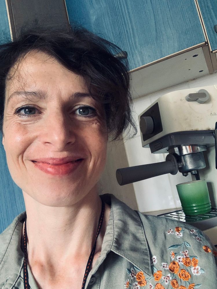 Me in the kitchen next to the coffee machine