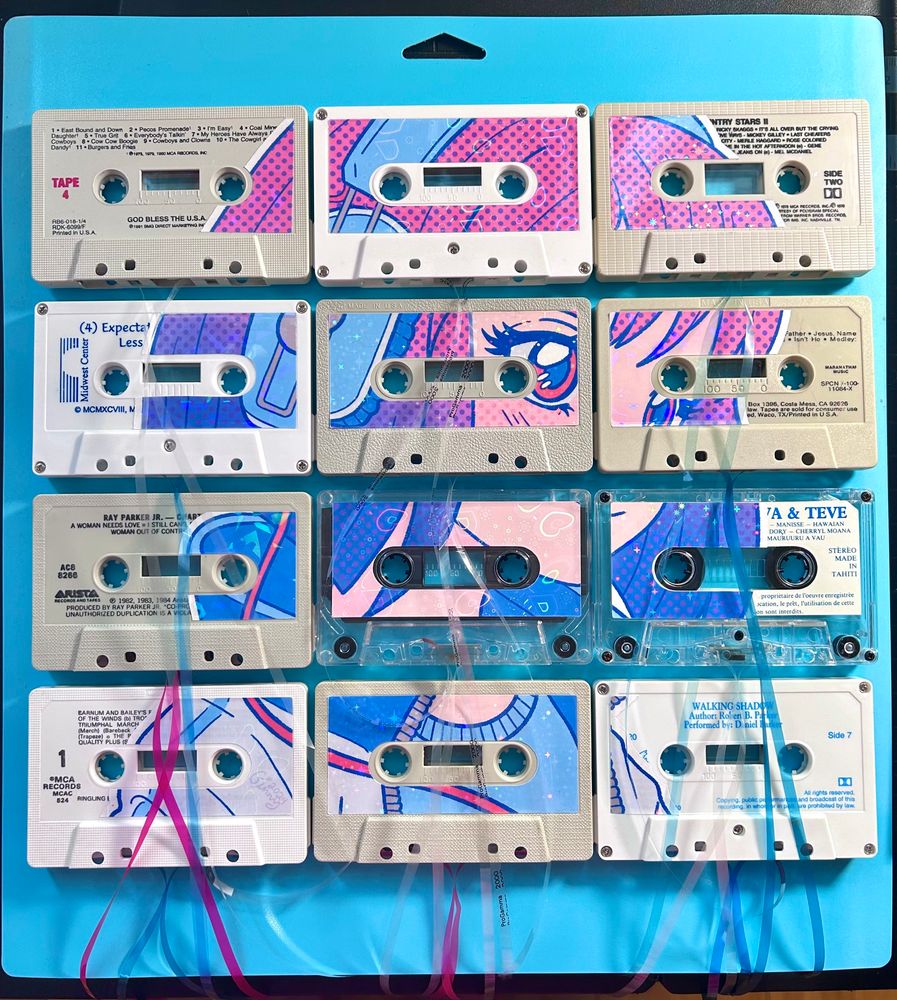 An anime girl image stuck onto cassette tapes in a grid. Mixed Media recycled art meets digital art