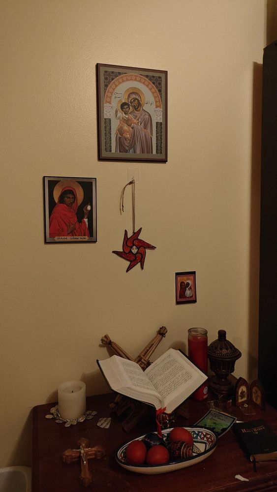 Image of an altar with icons and Bible
