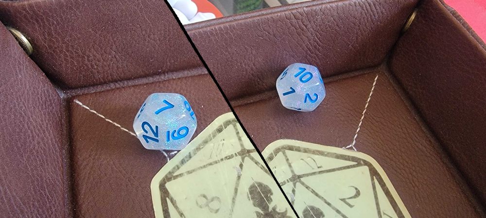 A composite of two photos of a 12-sided dice in a tray.  One photo shows the dice having rolled a 7, and the other shows the dice having rolled a 10.