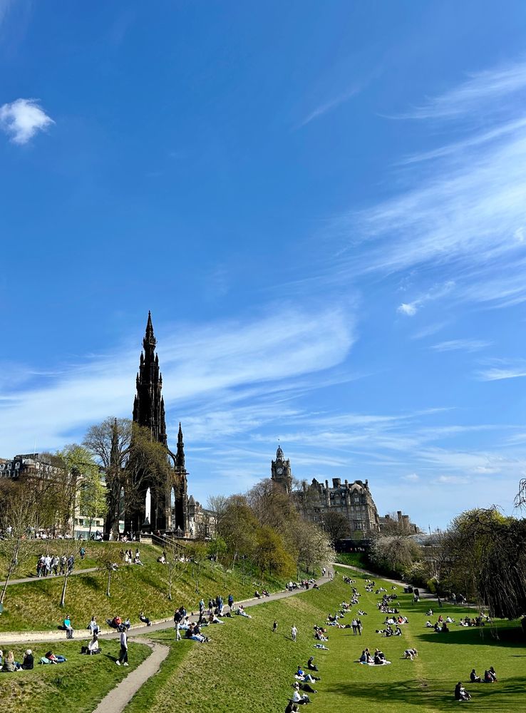 Princes Street gardens Edinburgh with Scott monument and Balmoral hotel 