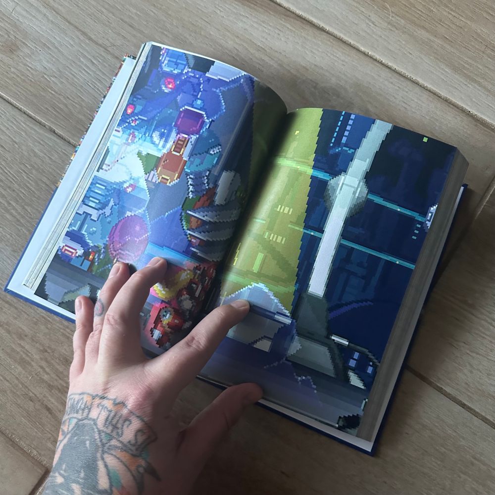 Interior of a book featuring coverage of PlayStation games. 