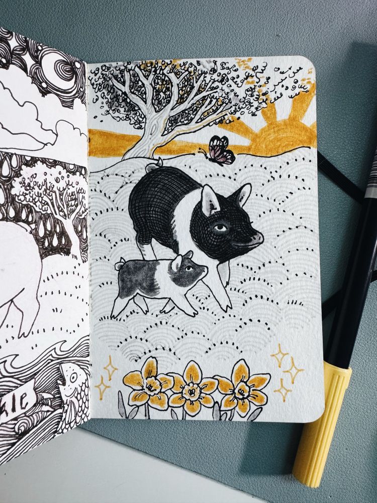 A drawing in a sketchbook of two pigs walking in a field with a butterfly above them with a sun and tree in the background and three daffodils with sparkles in the foreground 