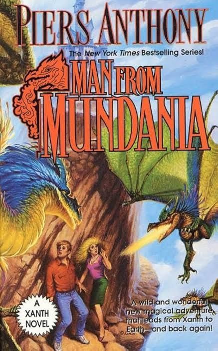 Old school looking Fantasy book by Piers Anthony titled "Man from Mundania". A dragon menaces a young couple.
