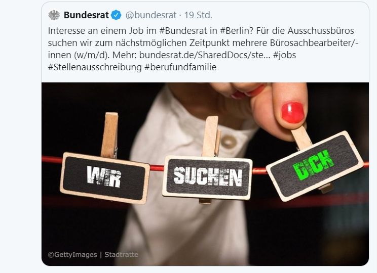 A screenshot of a job advertisement from the Bundesrat, the lower house of parliament in Germany. The text reads roughly "interested in a job at the #Bundesrat in #Berlin? We're looking for multiple clerks for the commission offices as soon as possible. Read more:" followed by links and more hashtags. The picture in the post has a hand putting 3 clothes pins on a clothesline. The clothes pins each have one word on them. Read from left to right, these are supposed to be "Wir suchen dich" (we are looking for you) in capital letters, but for some reason they decided to make the letters slightly withered, which results in the letter h reading like the letter k, thus reading "Wir sucken dick" (we suck dick) instead