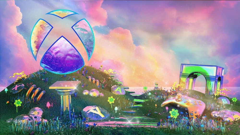A holographic Xbox logo in recognition of International Women’s Day floats above a pedestal in a grassy field. The field also contains other holographic items scattered throughout like an Xbox controller, Xbox controller buttons, and a square arch. There is a dreamy, pastel sky in the background.