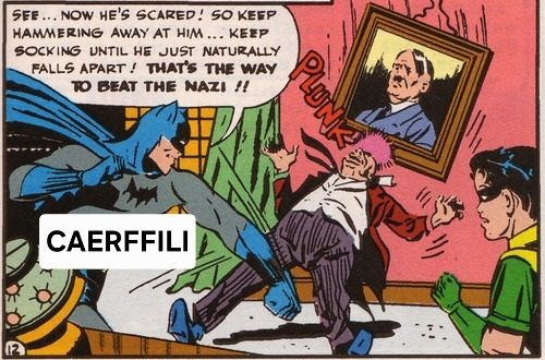 Batman punches a Nazi out, smashing him into a portrait of Hitler, saying "Keep hammering away at him until he falls apart. That's the way to beat the Nazi." I've written "Caerffili" over Batman, because I am very proud of my home right now. 