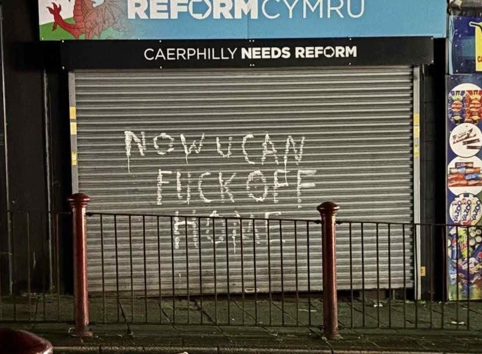 Graffiti on the shuttered Reform office in Caerffili that reads "Now u can fuck off home." God I love Wales. 