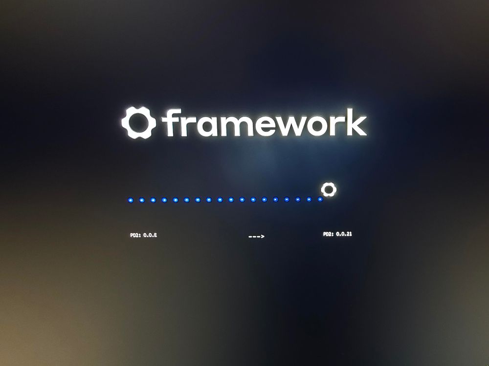 Photo of a Framework laptop BIOS flashing in progress. 