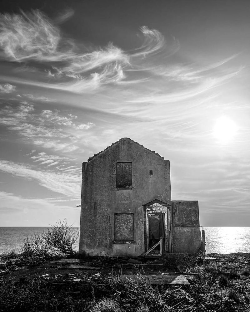 One push and this ruined building will topple into the waves. Perhaps.