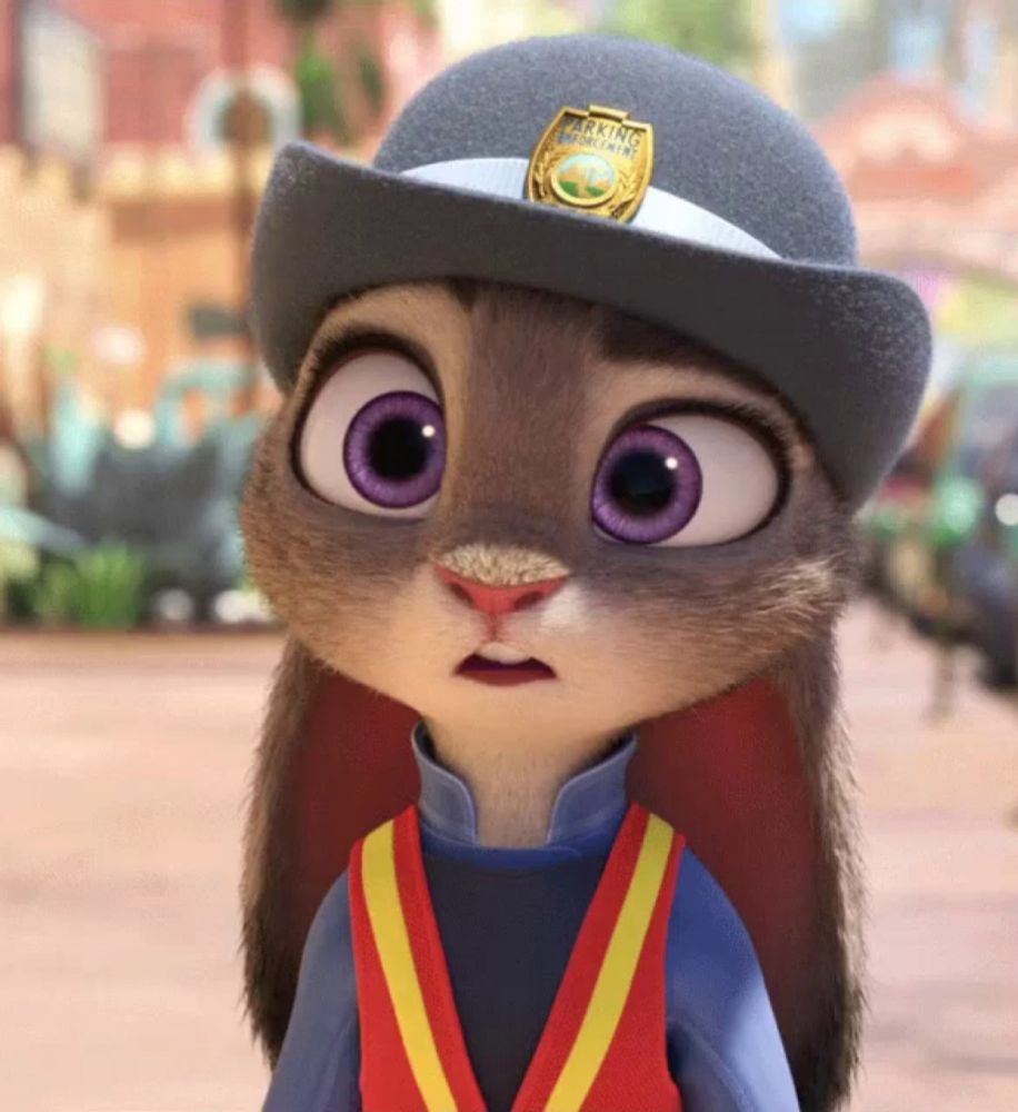 a cartoon rabbit wearing a hat with a badge that says police