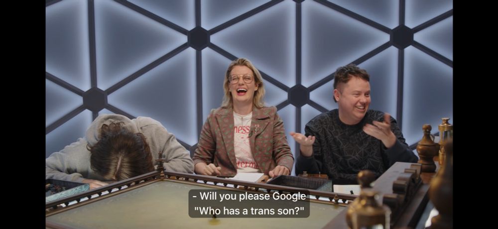 shot of murph, siobhan and beardsley. murph is face down on the table as siobhan cracks the fuck up and ally is sort of shrugging/pleading and requesting "Will you please Google 'Who has a trans son'?"