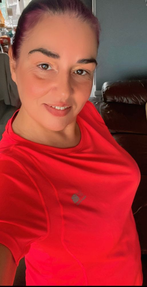 They wearing a bright pink T-shirt