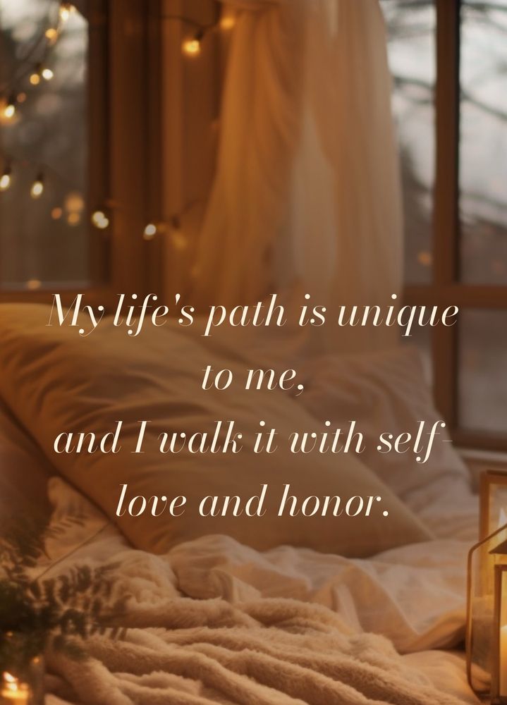 A comforting background with white plush  pillows and a white blanket, with a background of a window with nature beyond it.

“My life’s path is unique to me, and I walk it with self love and honor.”