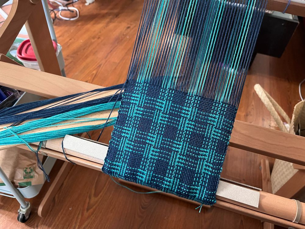 Navy and Turquoise scarf, woven in Celtic knots, on a rigid heddle loom.