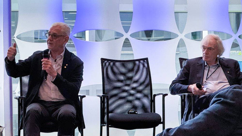 Drs. Julio Montaner and Pieter Cullis during the panel discussion at the 25th Annual Healthcare Summit on June 23, 2025.