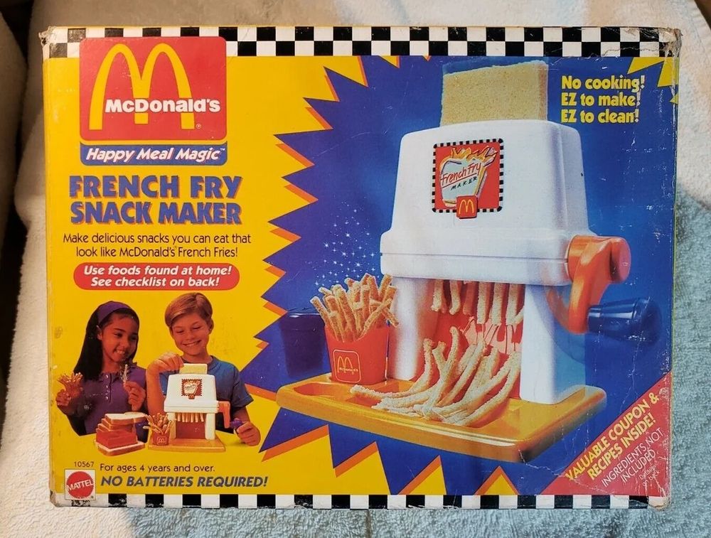 A 90s McDonald’s French fry snack maker toy box showing a huge white plastic contraption that simply cuts bread 