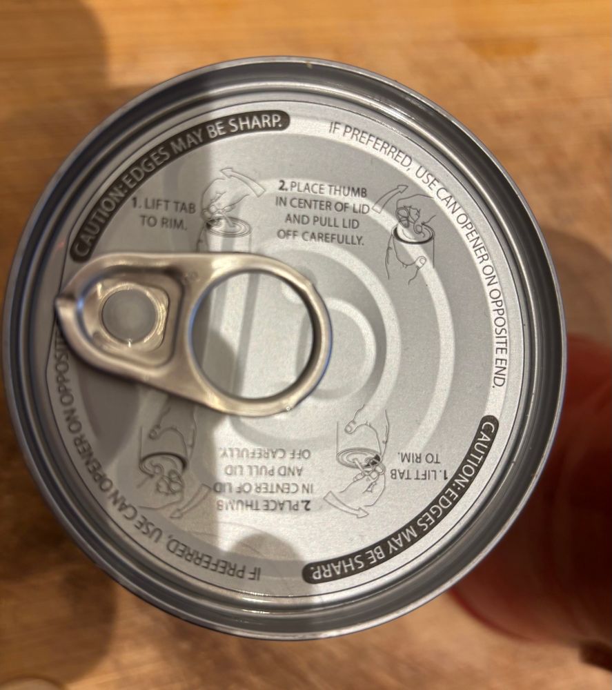 Coconut milk can showing the pull tab and instructions