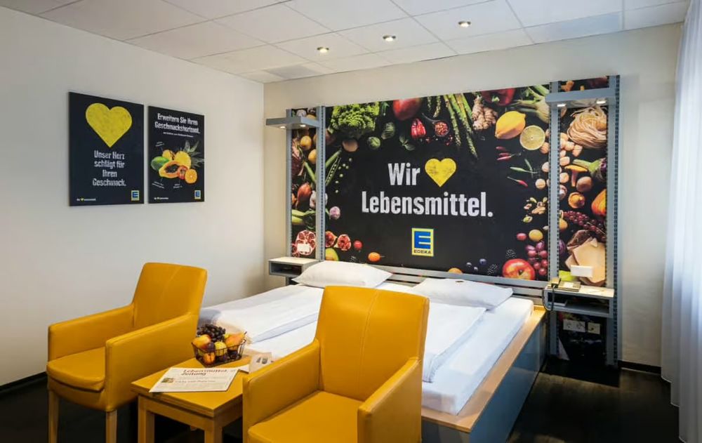 A hotel room themed to the German supermarket brand Edeka 