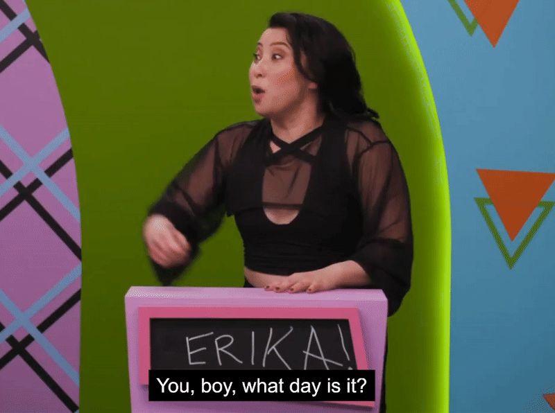 A GIF from an episode of Dropout's 'Make Some Noise', featuring Erika Ishii asking, 'You, boy, what day is it?'
