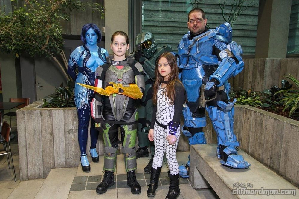 Family in cosplay from Halo and Mass Effect
Dad: Spartan Thorne
Mom: Cortana
Son: Master Chief
Daughter: Commander Shephard
Daughter: Miranda
