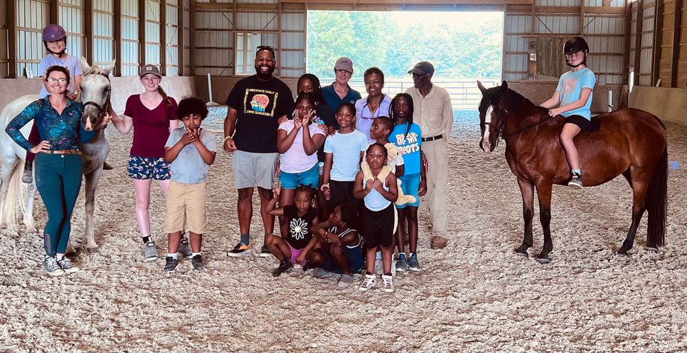 Group photo showing staff and students. Also showing Wendy and Stella (ponies). 