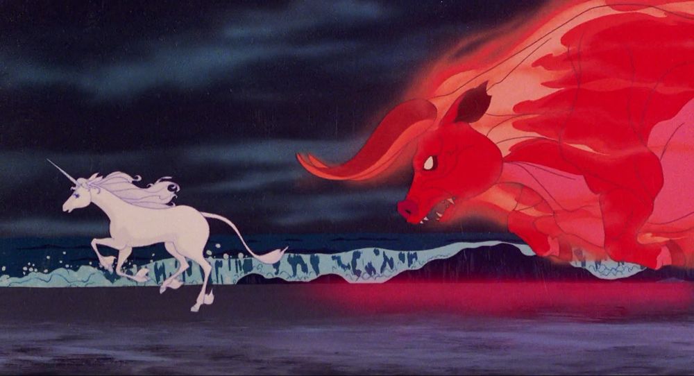 A still from the movie The Last Unicorn (1982). The Red Bull is chasing the titular Unicorn.