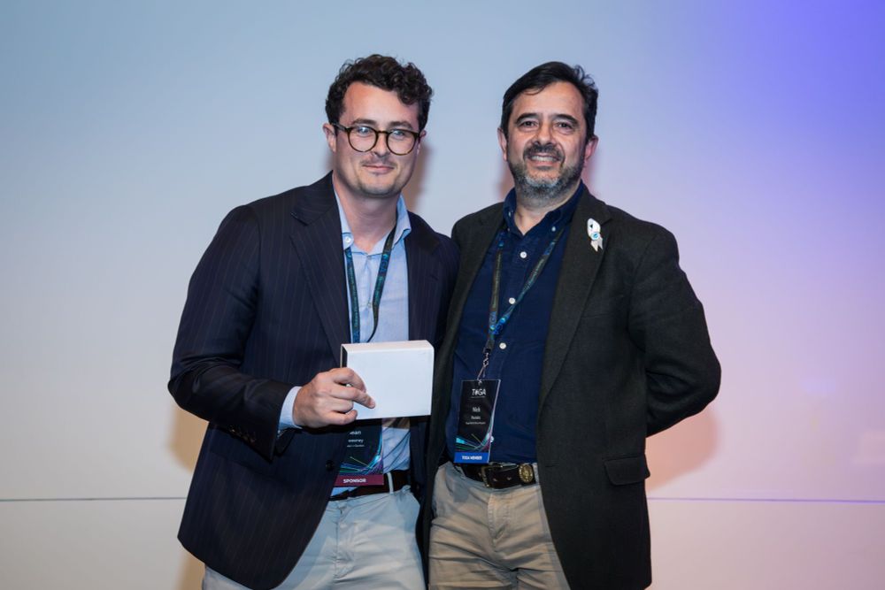 Sean Sweeney accepting on behalf of Joanne Wade and Prof Nick Pavlakis