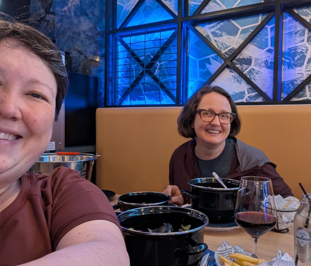 Posing in front of our large pot of mussels